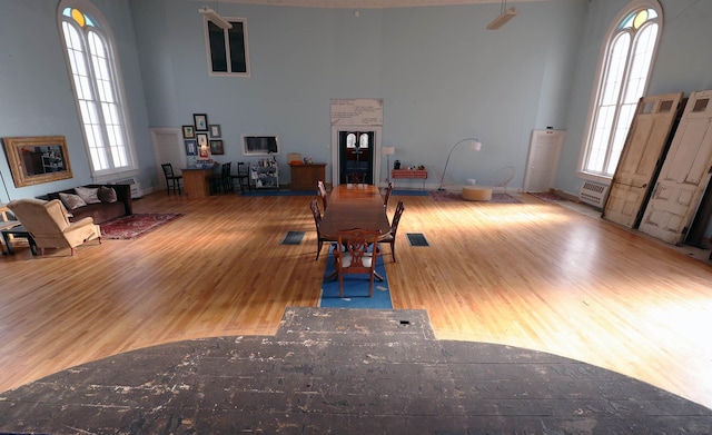 interior space with a wealth of natural light and wood-type flooring