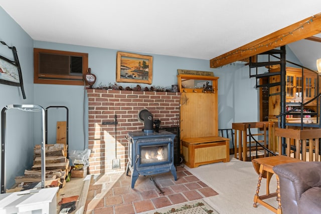 151 Mountain View Dr, Acton, ME 04001 - living room featuring beam ceiling, a wood stove, and an AC wall unit