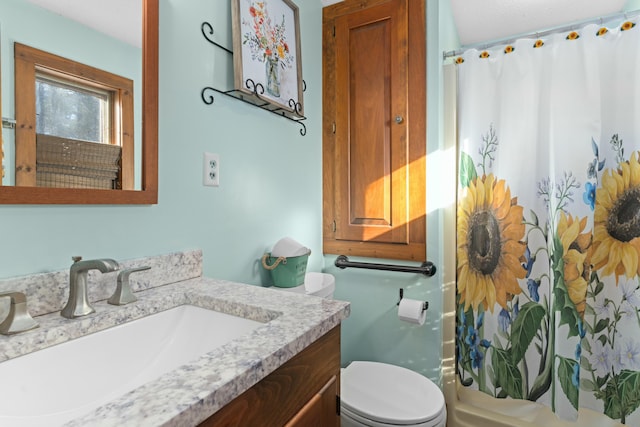 151 Mountain View Dr, Acton, ME 04001 - bathroom featuring a shower with curtain, vanity, and toilet