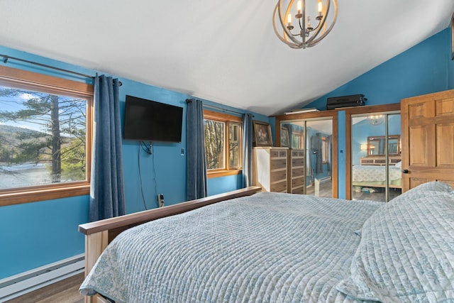 151 Mountain View Dr, Acton, ME 04001 - bedroom with baseboard heating, hardwood / wood-style floors, a chandelier, and vaulted ceiling