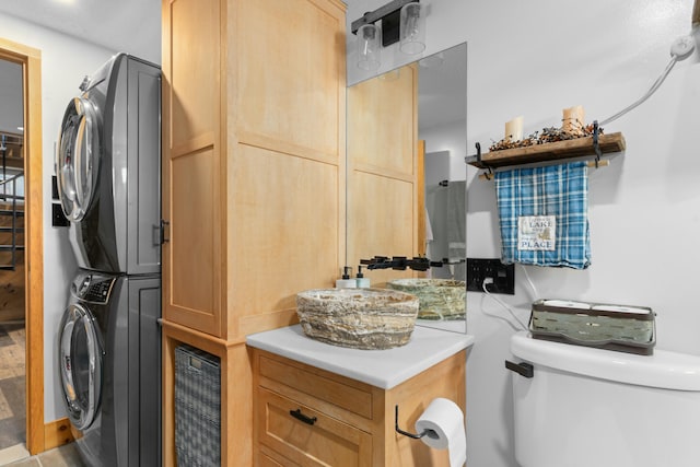 151 Mountain View Dr, Acton, ME 04001 - clothes washing area featuring wine cooler and stacked washer and clothes dryer