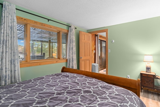151 Mountain View Dr, Acton, ME 04001 - bedroom featuring a textured ceiling