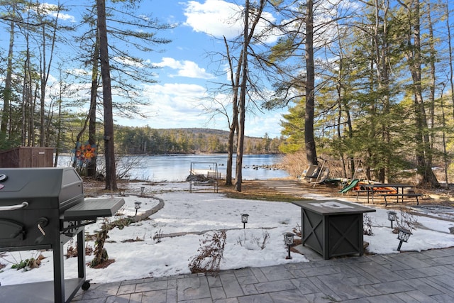 151 Mountain View Dr, Acton, ME 04001 - snow covered patio with a grill and a water view