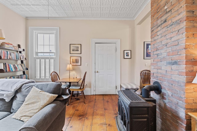 interior space with wood-type flooring and ornamental molding