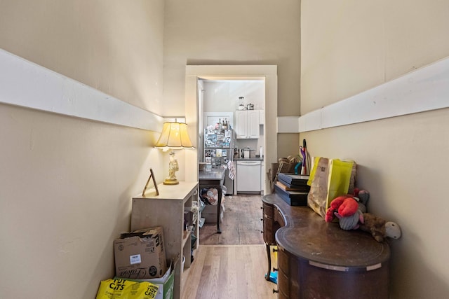 hallway featuring light hardwood / wood-style flooring