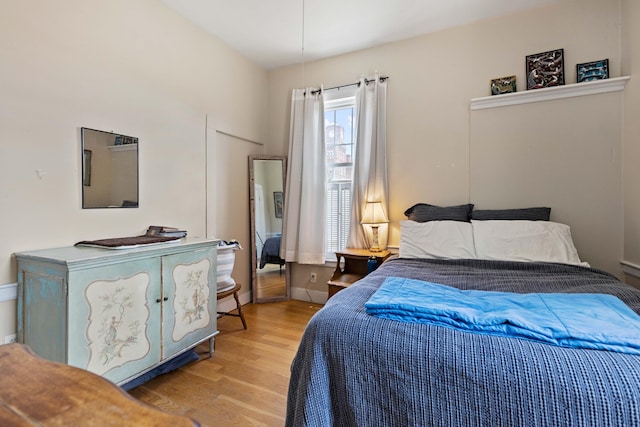 bedroom featuring light hardwood / wood-style flooring