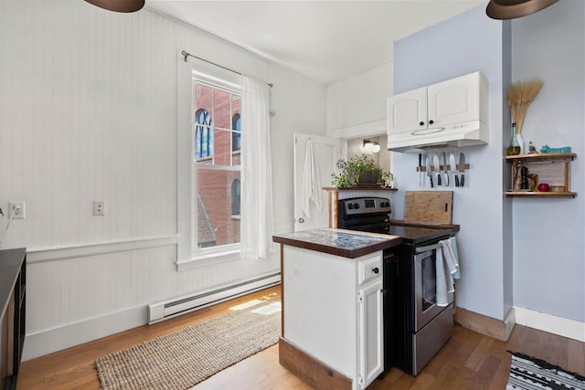 kitchen featuring white cabinets, electric stove, light hardwood / wood-style flooring, and a baseboard heating unit