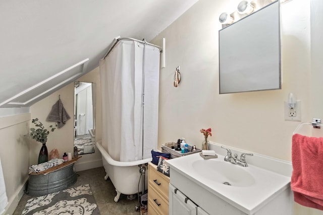 bathroom with vanity, tile patterned floors, and shower / bath combo with shower curtain