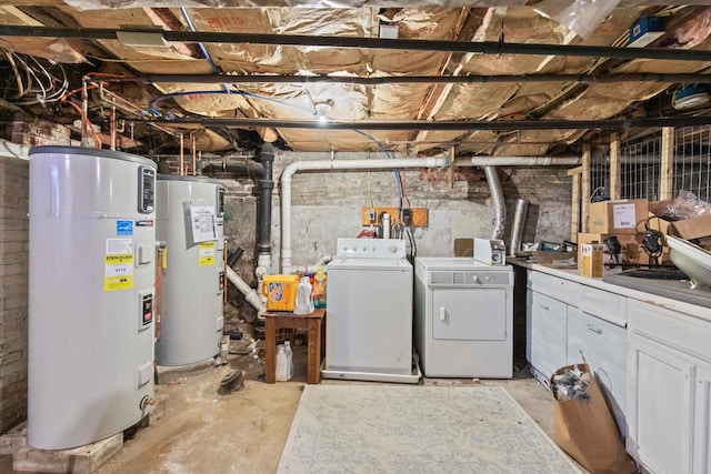 basement featuring gas water heater, washing machine and dryer, and water heater