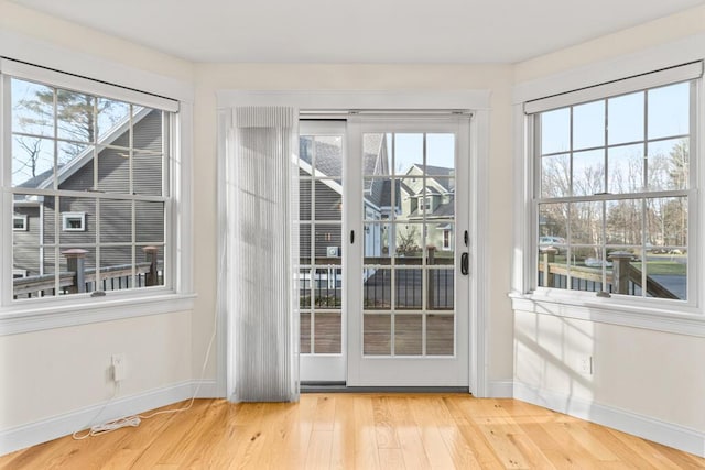 doorway to outside featuring light hardwood / wood-style floors