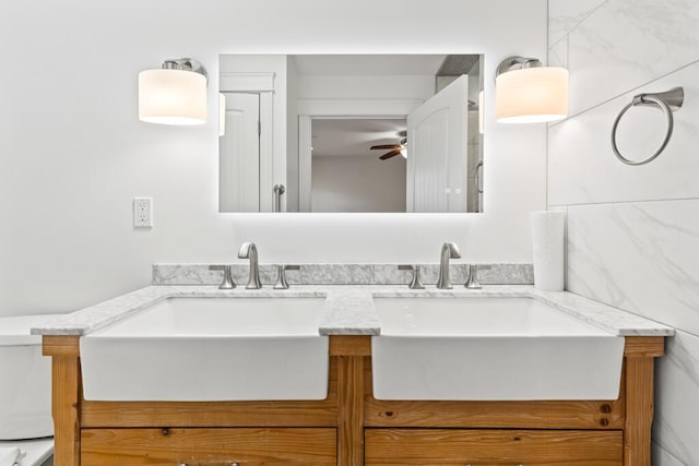 bathroom featuring vanity and ceiling fan