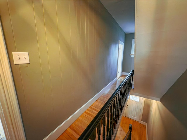 stairway featuring hardwood / wood-style floors