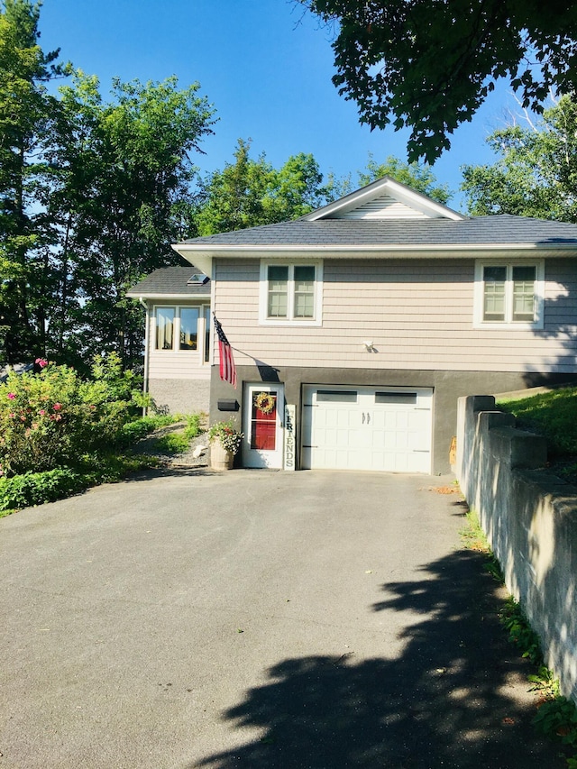 view of front of property featuring a garage