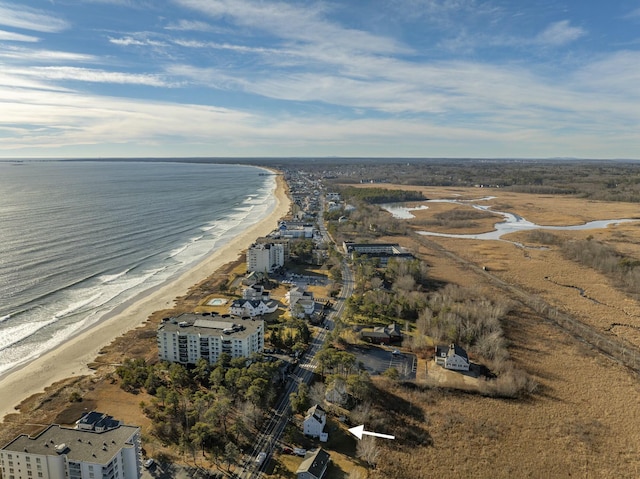 aerial view featuring a water view and a beach view