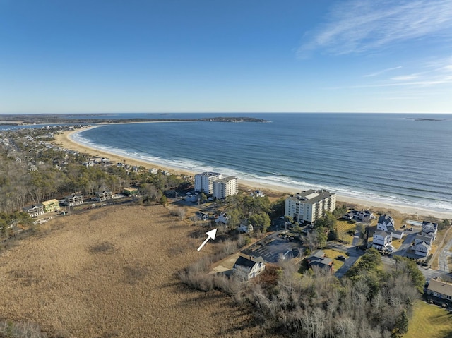 drone / aerial view featuring a view of the beach and a water view