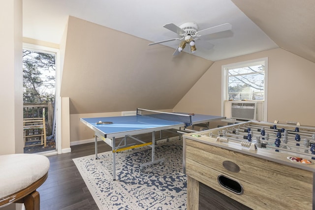 game room featuring ceiling fan, dark hardwood / wood-style flooring, cooling unit, and vaulted ceiling