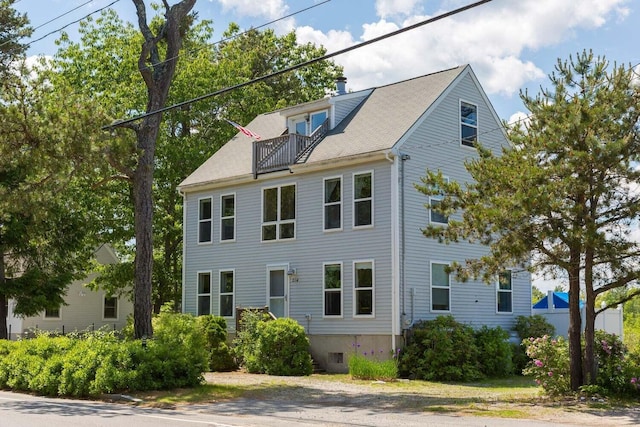 view of property exterior featuring a balcony