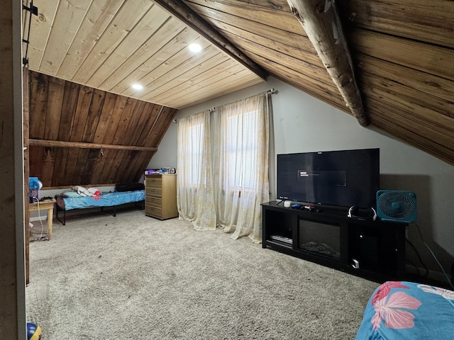 carpeted bedroom featuring vaulted ceiling and wood ceiling