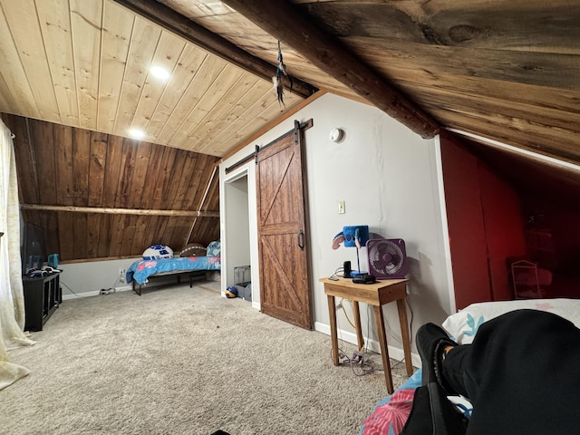 bonus room with vaulted ceiling with beams, a barn door, carpet flooring, wooden ceiling, and baseboards