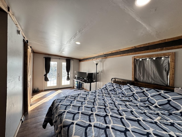 bedroom featuring access to exterior, baseboards, wood finished floors, and french doors