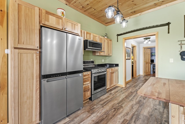 kitchen featuring light brown cabinets, hanging light fixtures, stainless steel appliances, dark hardwood / wood-style floors, and wood ceiling