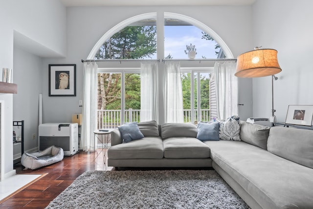 living room with a towering ceiling