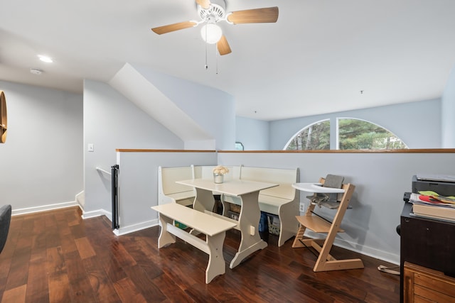 dining space with dark hardwood / wood-style floors and ceiling fan