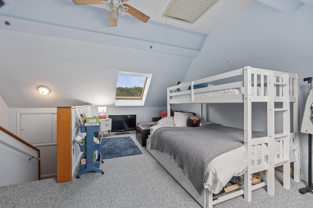 bedroom with carpet, vaulted ceiling, and ceiling fan