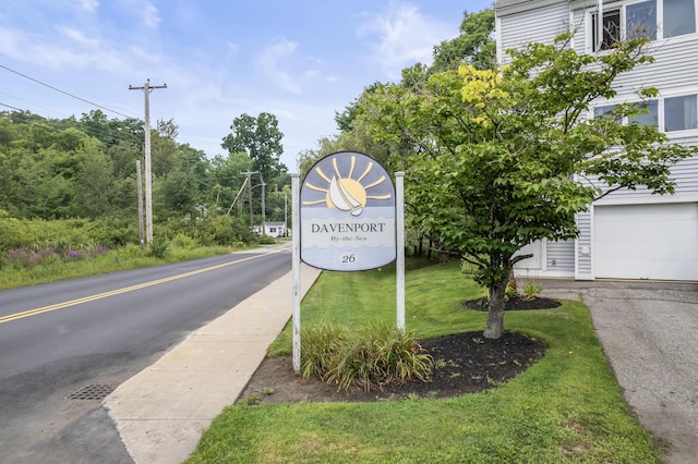 community sign with a garage