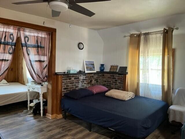 bedroom featuring wood-type flooring and ceiling fan