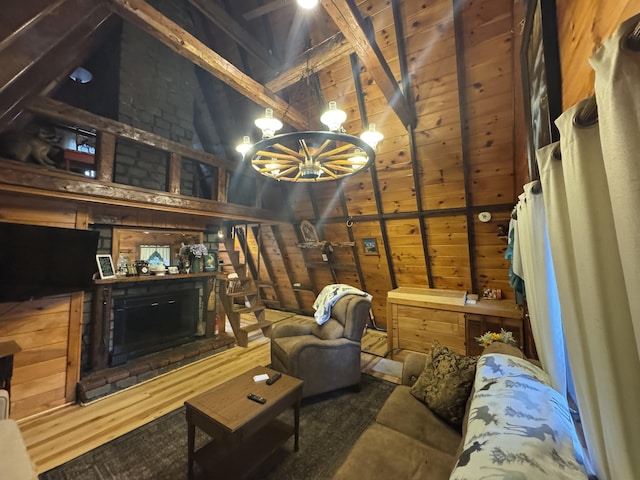 living room with wood walls, beam ceiling, wooden ceiling, and high vaulted ceiling