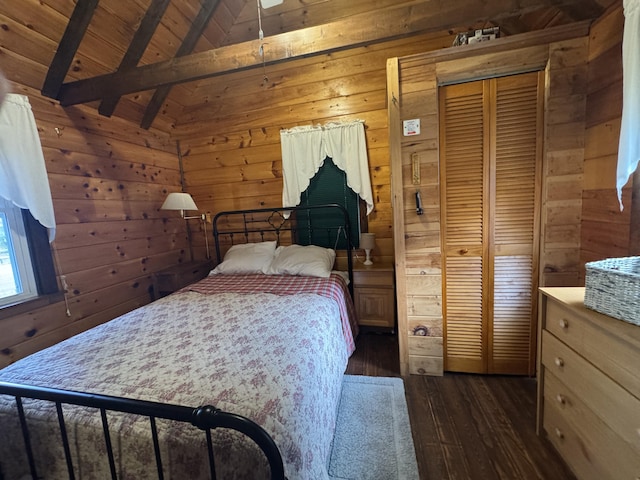 bedroom featuring wooden ceiling, lofted ceiling with beams, dark hardwood / wood-style floors, wood walls, and a closet