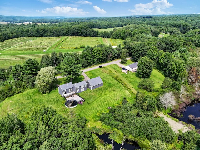 aerial view with a rural view and a water view