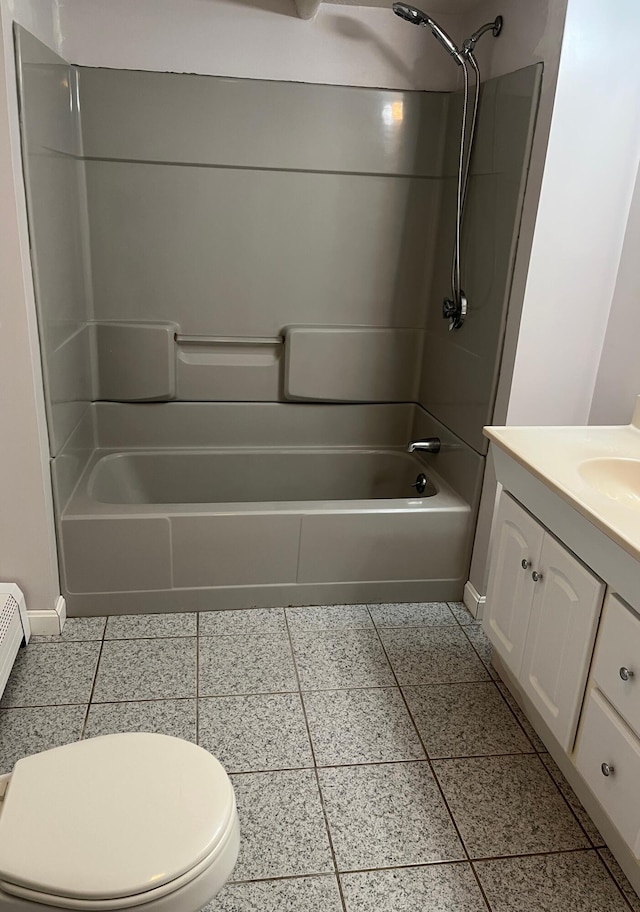 full bathroom featuring vanity,  shower combination, and toilet