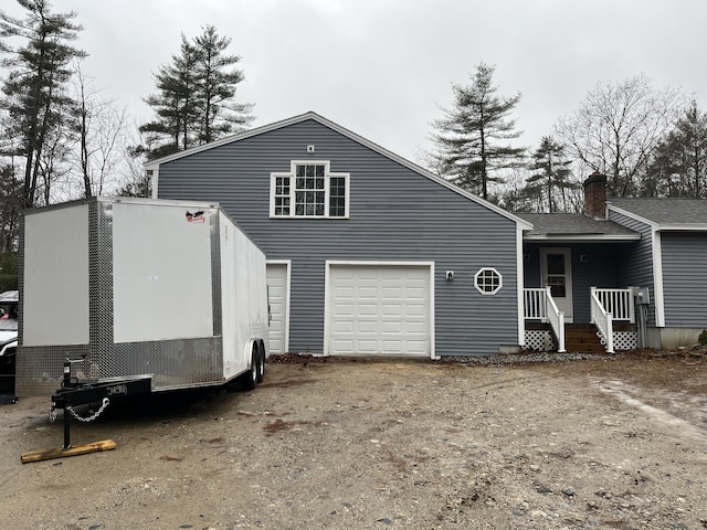 exterior space with a garage