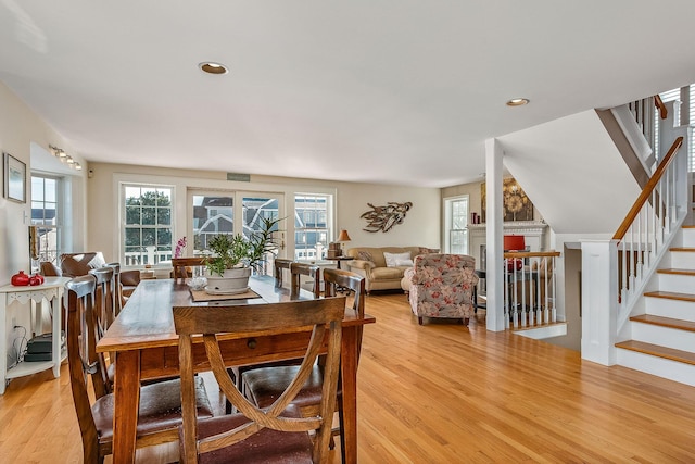 dining space featuring light hardwood / wood-style flooring