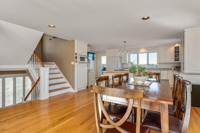 dining room featuring light hardwood / wood-style floors