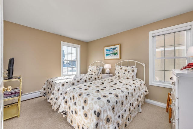 bedroom with light colored carpet