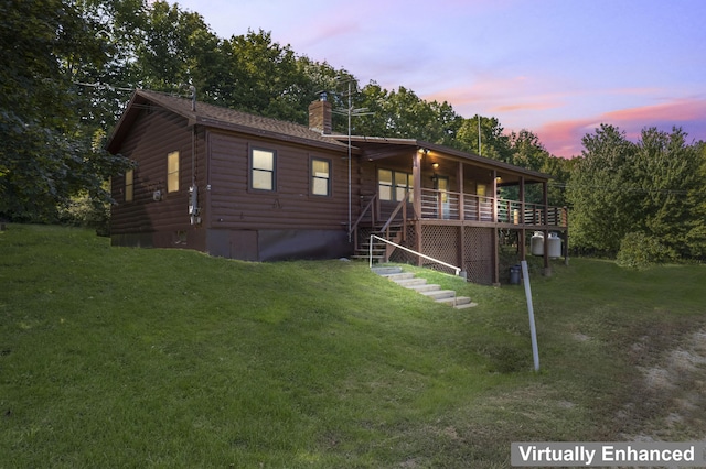 cabin featuring a yard