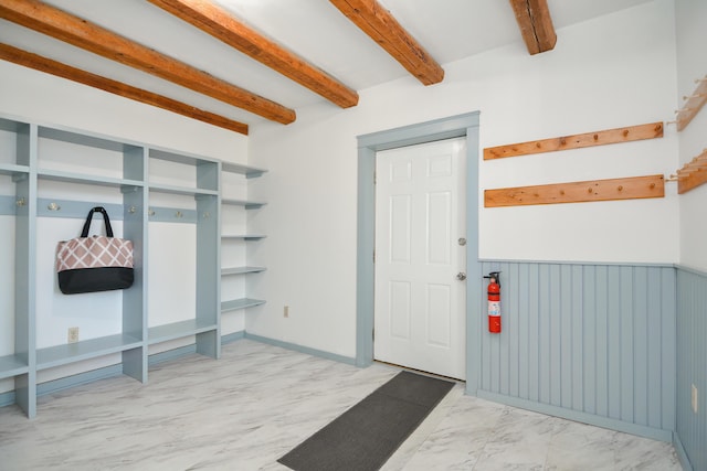 mudroom with beam ceiling