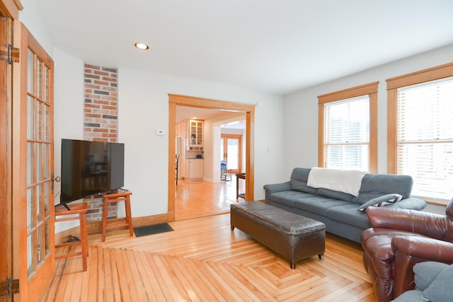 living room with light parquet floors