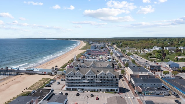 drone / aerial view with a view of the beach and a water view