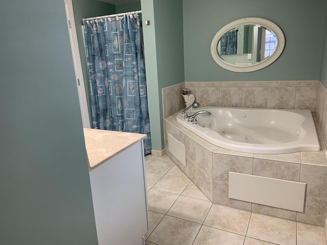 bathroom featuring tile patterned floors, separate shower and tub, and vanity