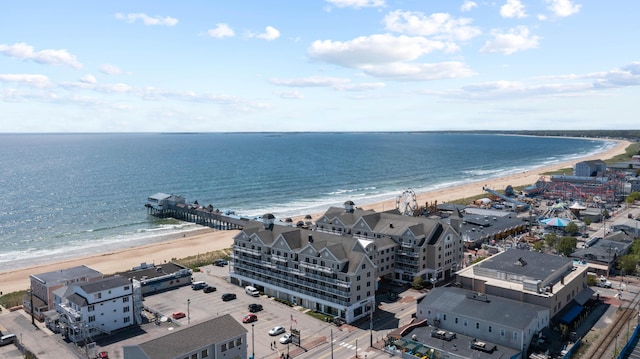 bird's eye view with a beach view and a water view