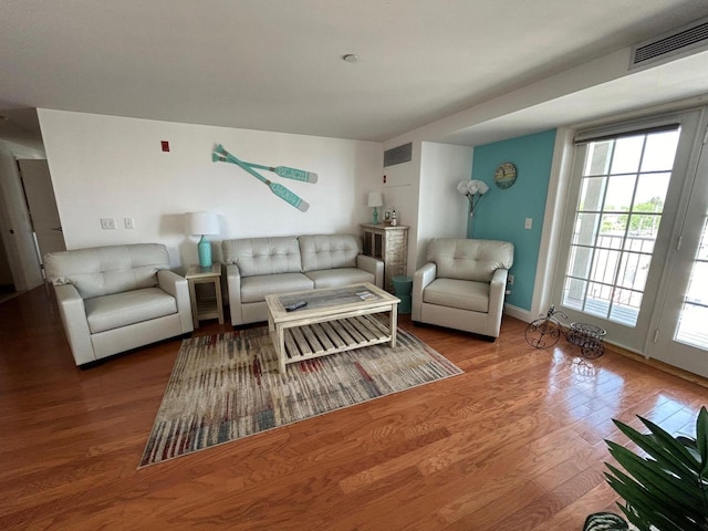 living room with hardwood / wood-style flooring