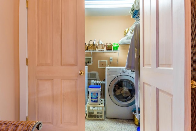 washroom featuring washer / clothes dryer