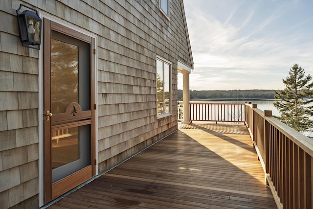 deck featuring a water view