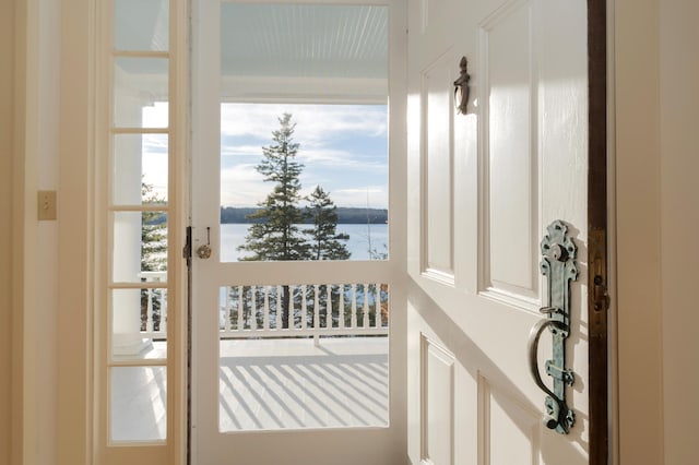 doorway featuring a water view