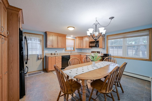 dining area with a textured ceiling, a notable chandelier, sink, and a baseboard heating unit