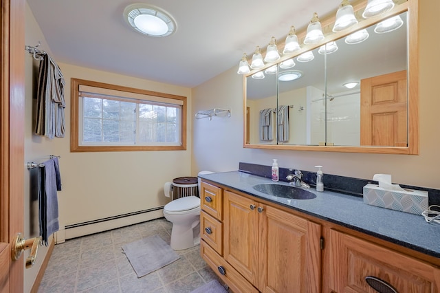 bathroom with walk in shower, vanity, toilet, and baseboard heating